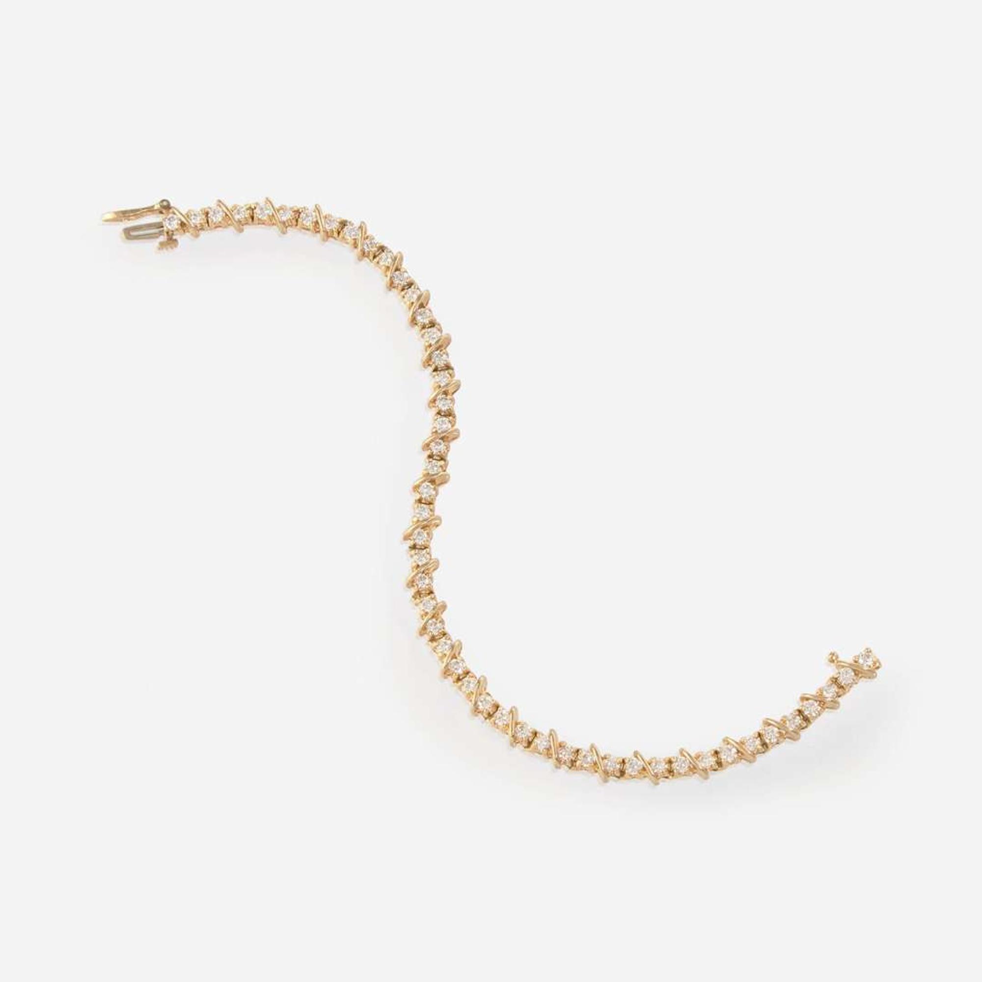 A 14K Yellow Gold and Diamond Bracelet