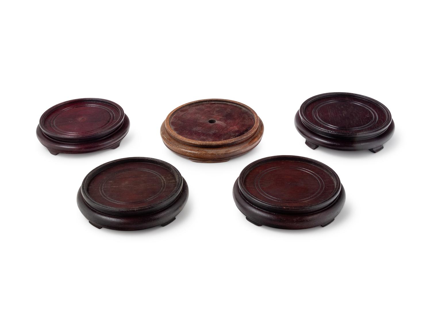 Twenty-five Chinese Hardwood Stands