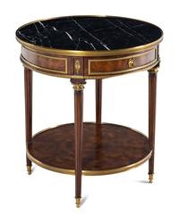 A Louis XVI Style Gilt Metal Mounted Marble-Top Mahogany Guéridon