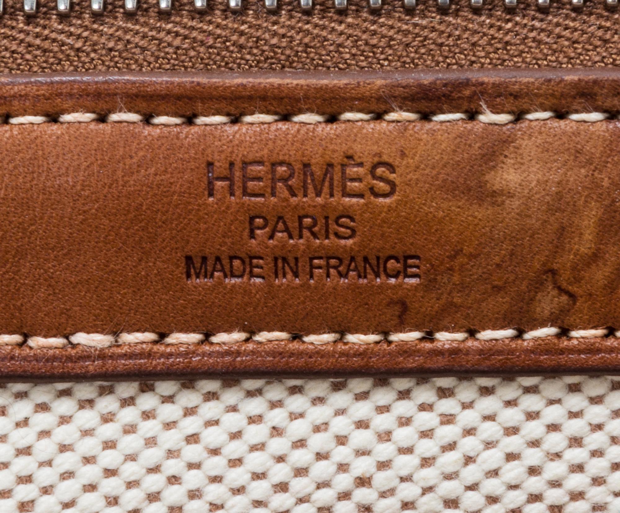 An Hermes Ecru Toile and Veau Barenia Mira Tote Bag, 14" x 14" x 5.5".