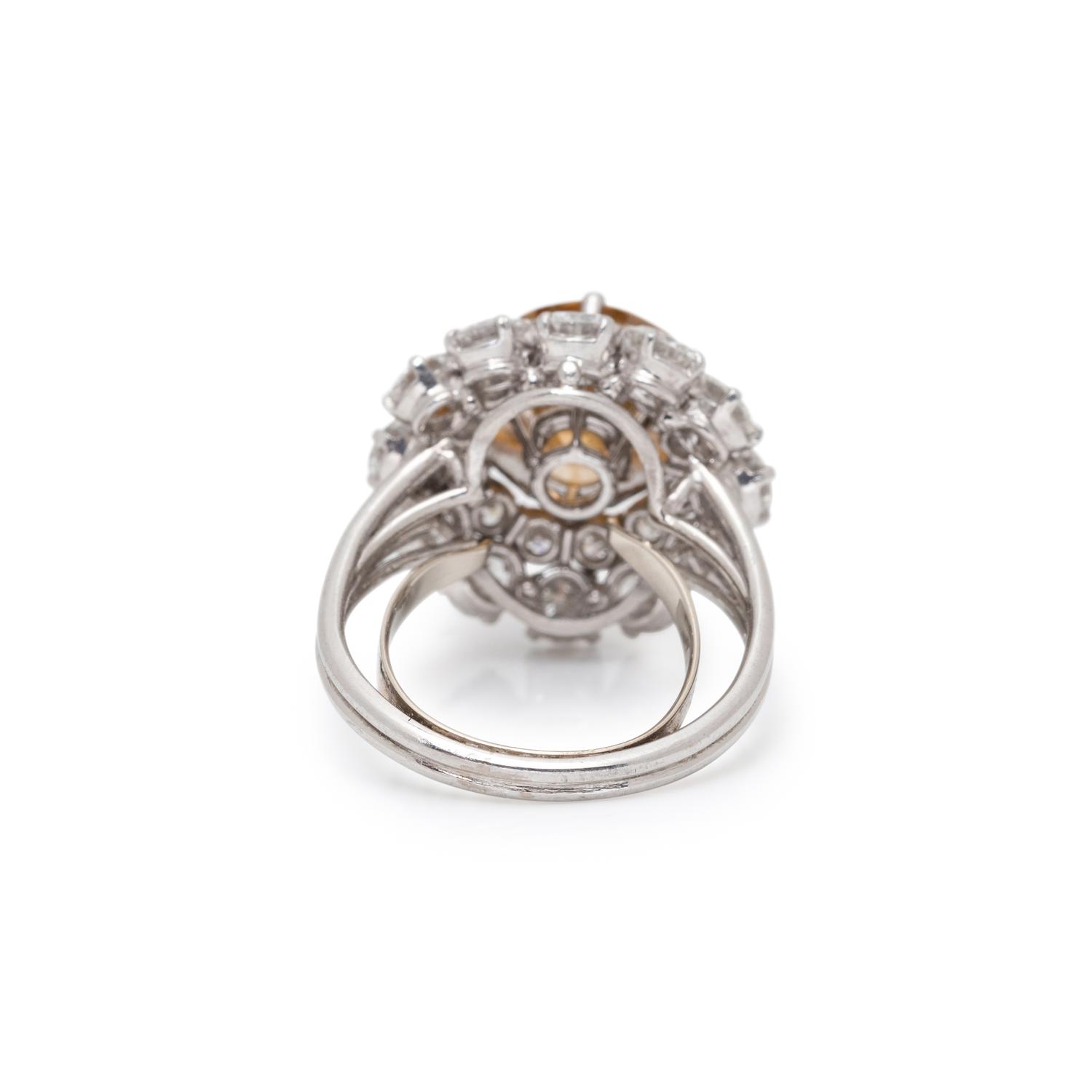 FANCY DEEP BROWNISH ORANGY YELLOW DIAMOND AND DIAMOND RING