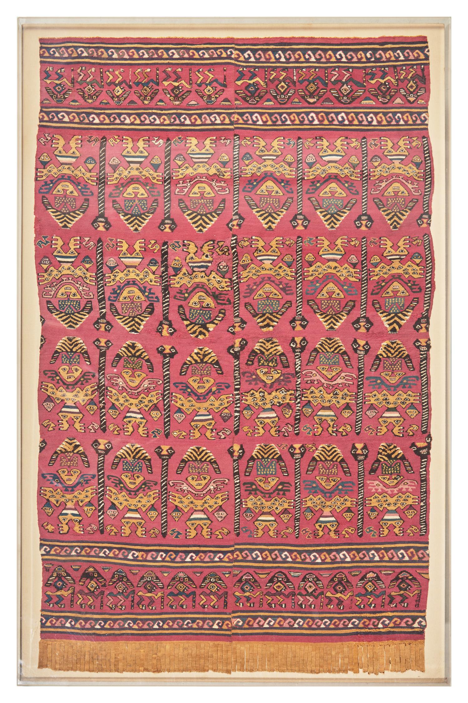 A Chimu Unku Textile with Warriors Carrying Heads