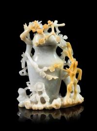 A Russet and Pale Celadon Jadeite Covered Vase Height 6 inches. — 20TH CENTURY