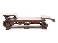 A Chinese Hardwood Scroll-Form Stand
