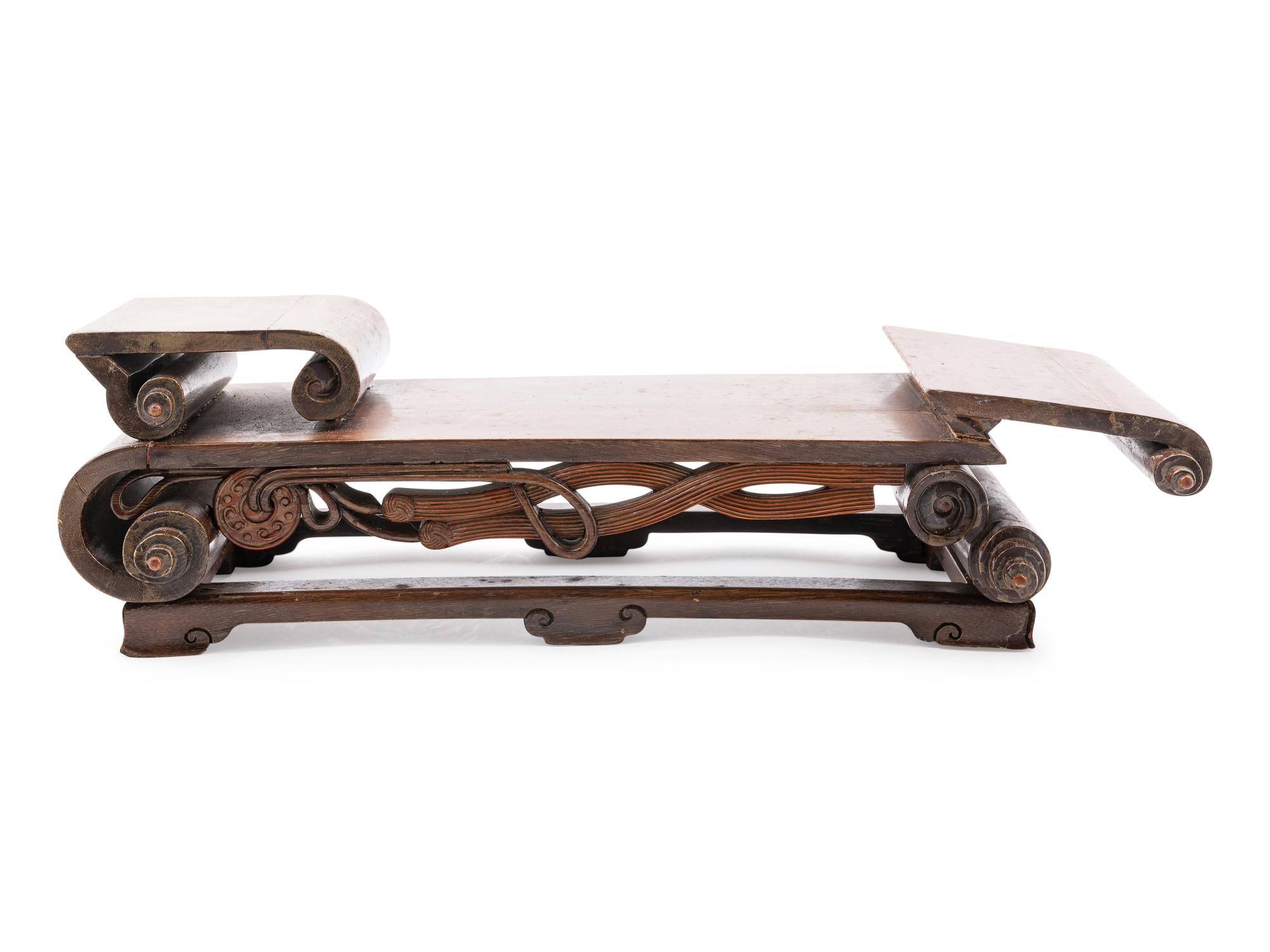 A Chinese Hardwood Scroll-Form Stand