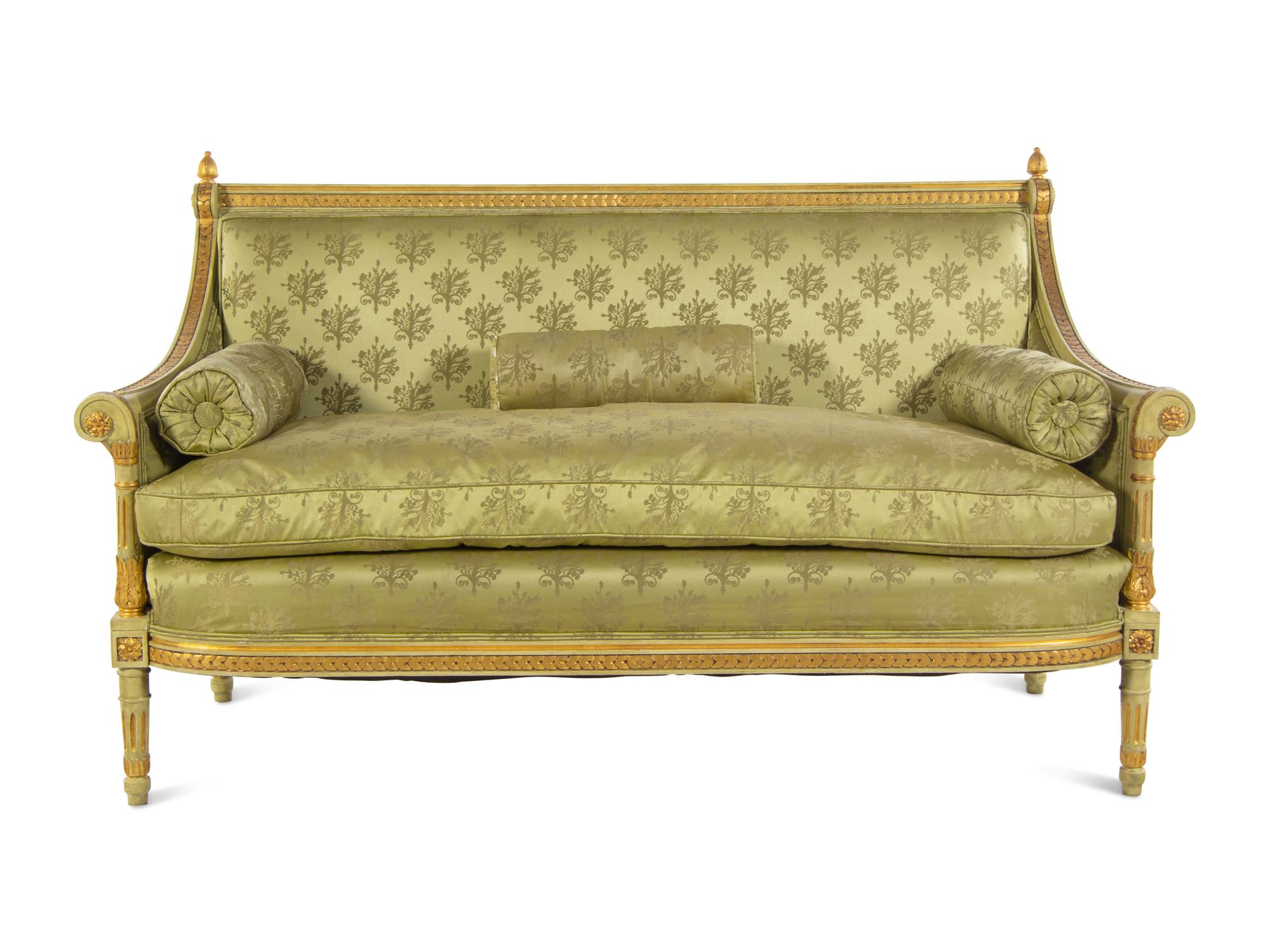 A Louis XVI Style Painted and Parcel Gilt Settee