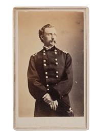 [CUSTER, George Armstrong (1839-1876)]. CDV standing portrait of Custer as brigadier general. Ca 1864.