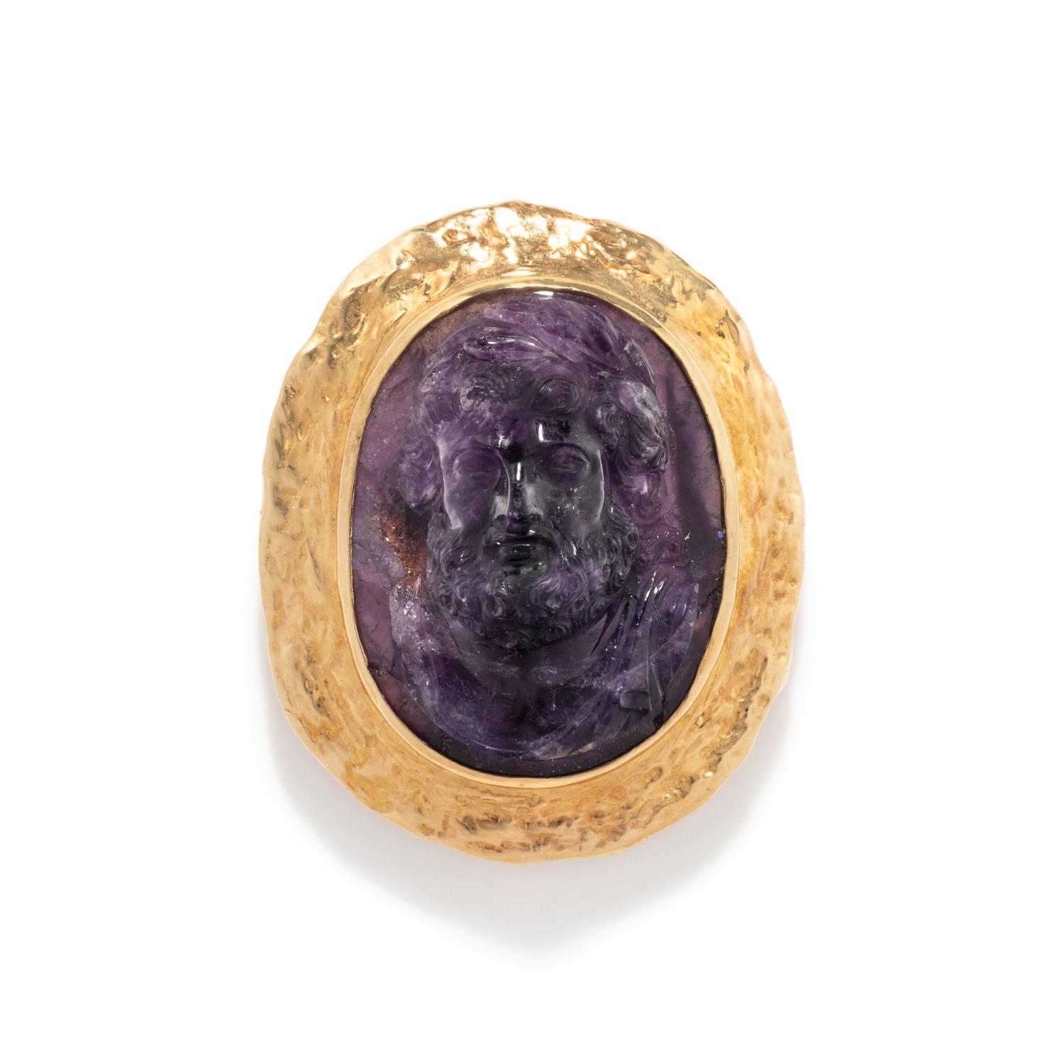 A Neoclassical Gold and Amethyst Cameo Brooch with a Portrait of the God Zeus