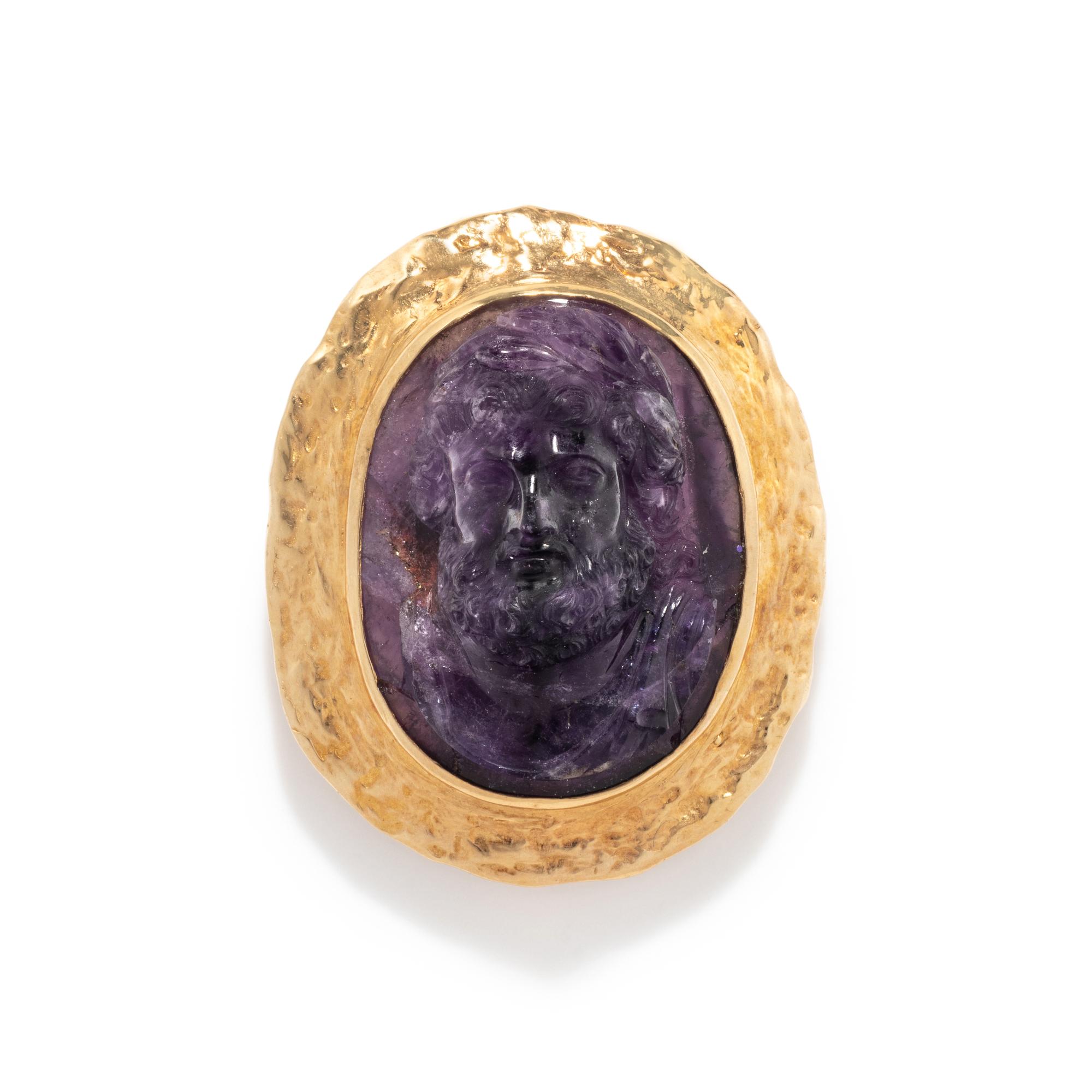 A Neoclassical Gold and Amethyst Cameo Brooch with a Portrait of the God Zeus