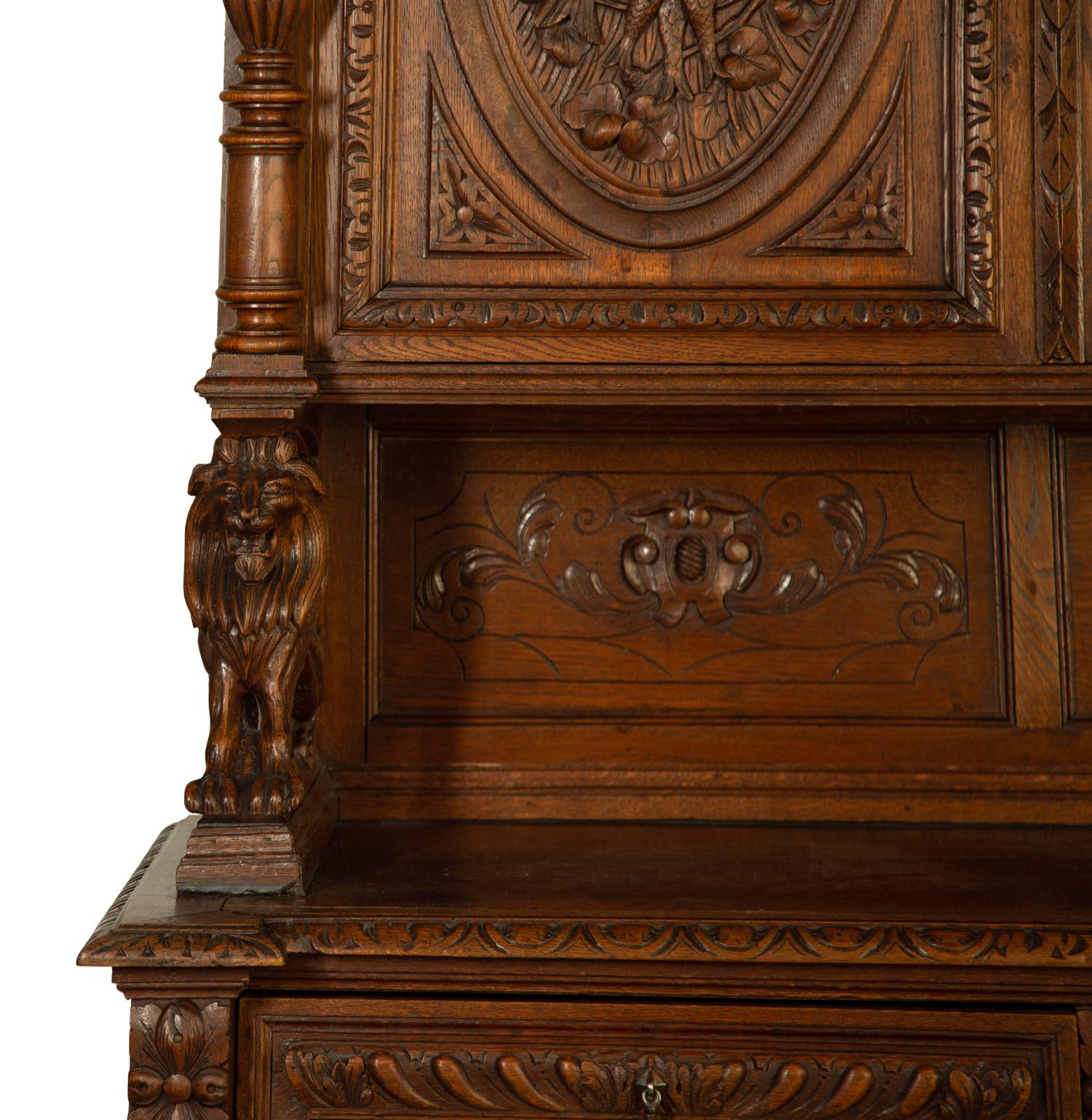 A German Carved Oak Hunt Cabinet