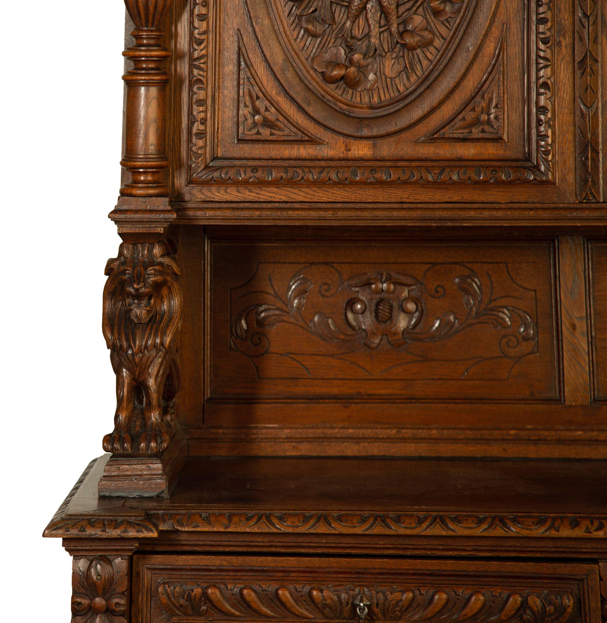 A German Carved Oak Hunt Cabinet