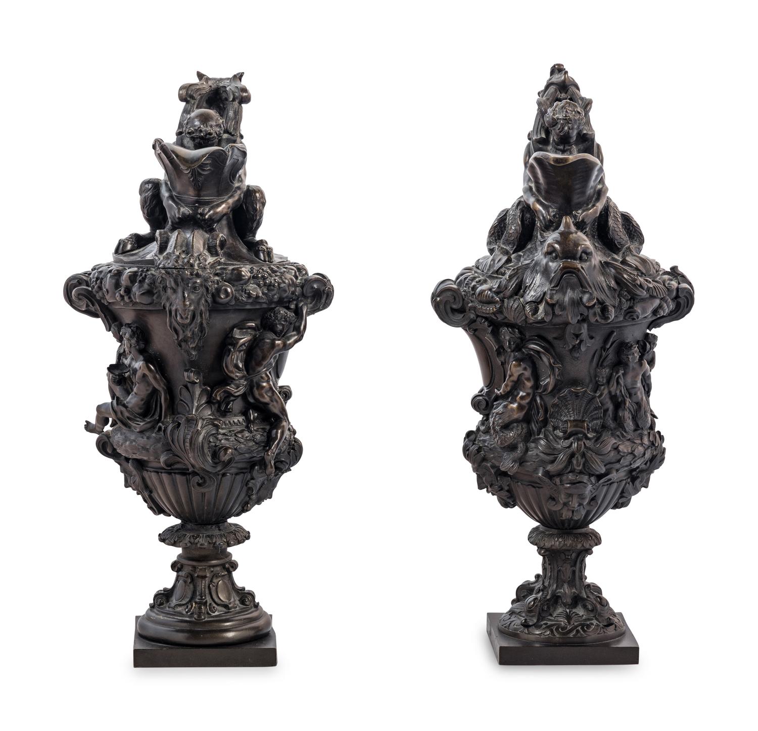 A Pair of Grand Tour Bronze Ewers Emblematic of Water and Earth
