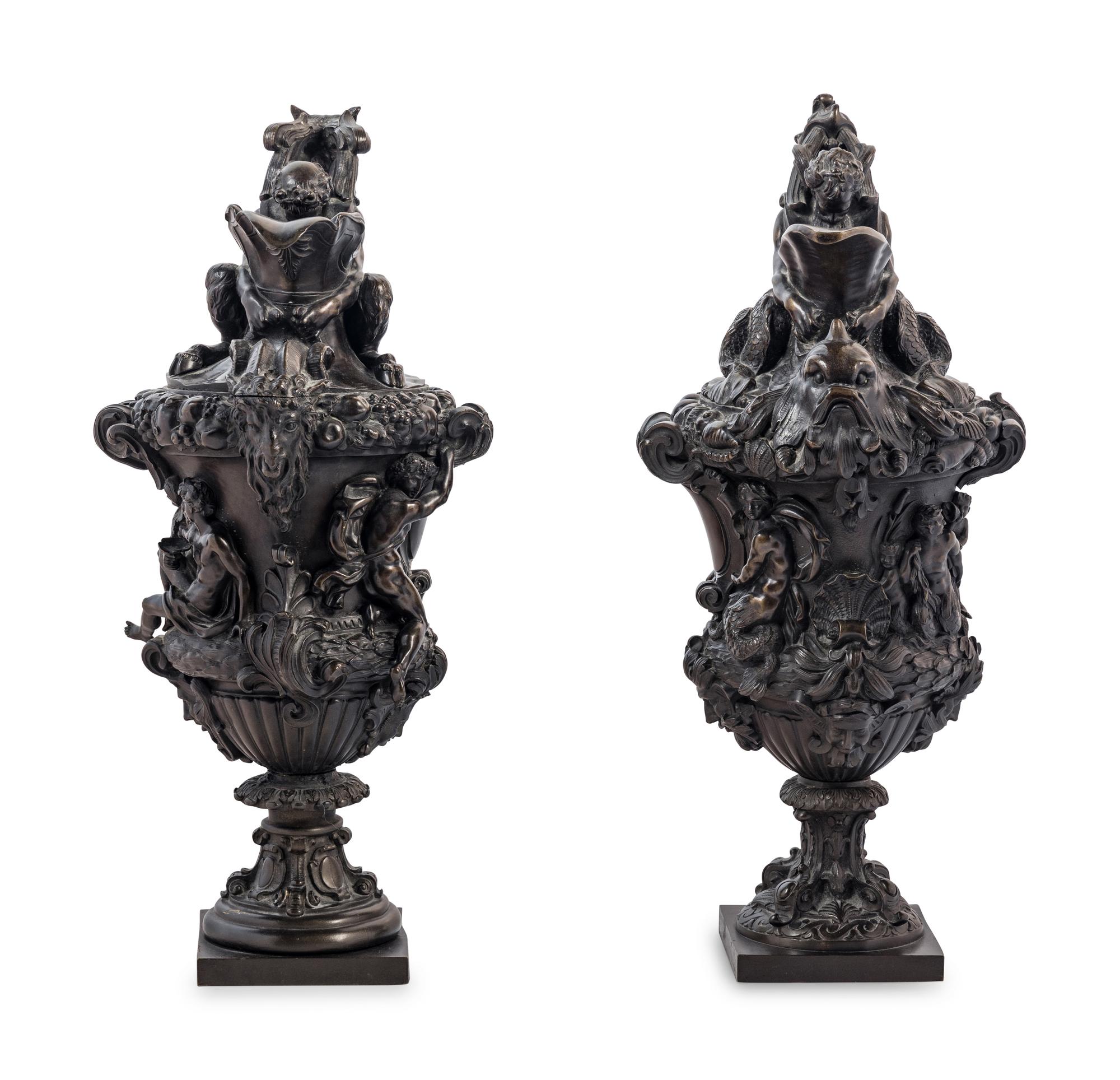 A Pair of Grand Tour Bronze Ewers Emblematic of Water and Earth