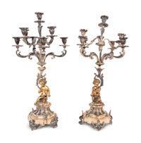A Pair of Silver-Plate Figural Eight-Light Candelabra