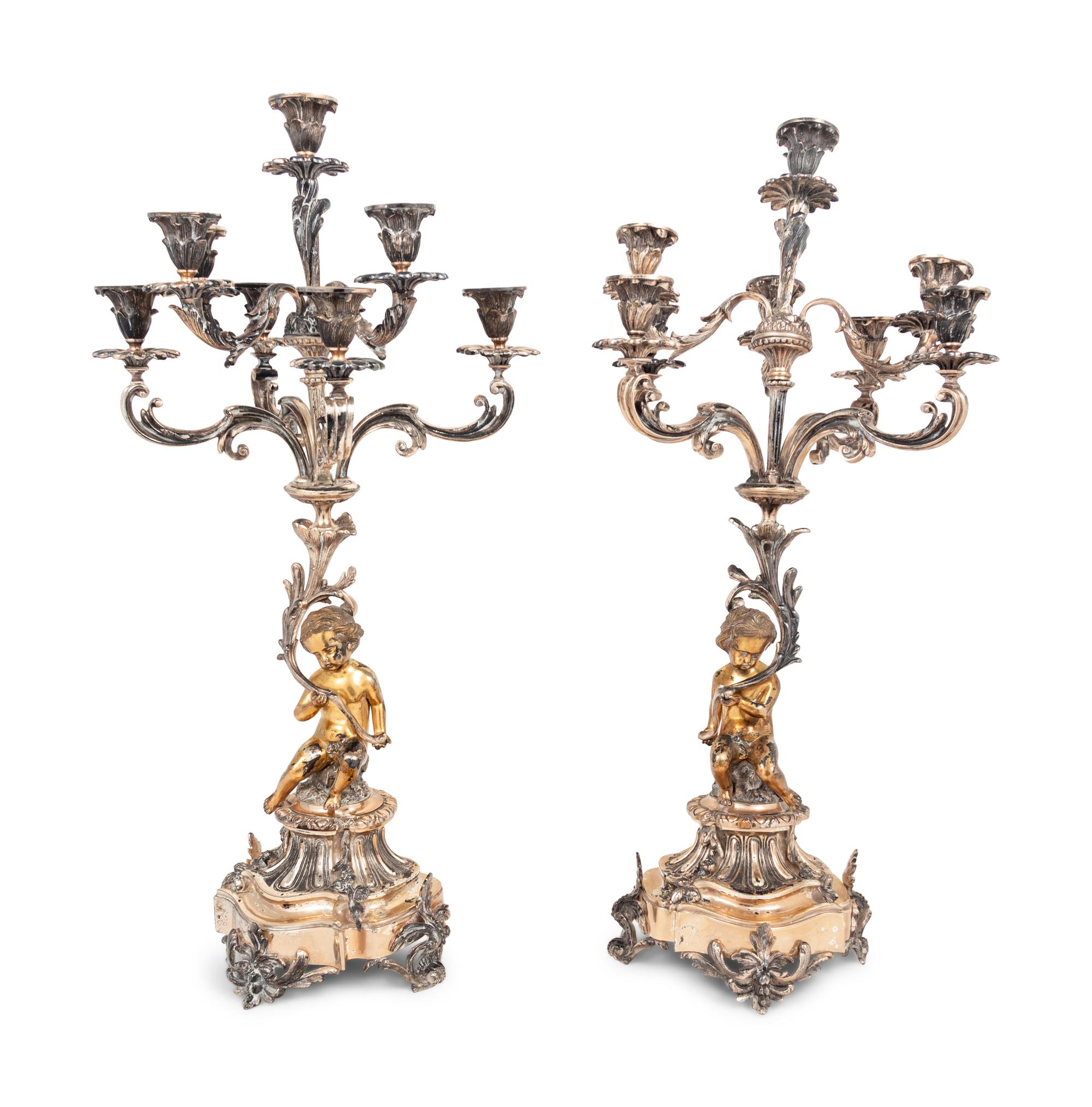 A Pair of Silver-Plate Figural Eight-Light Candelabra