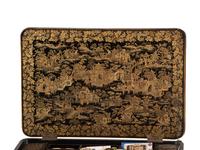 A Chinese Export Gilt and Black Lacquered Sewing Table