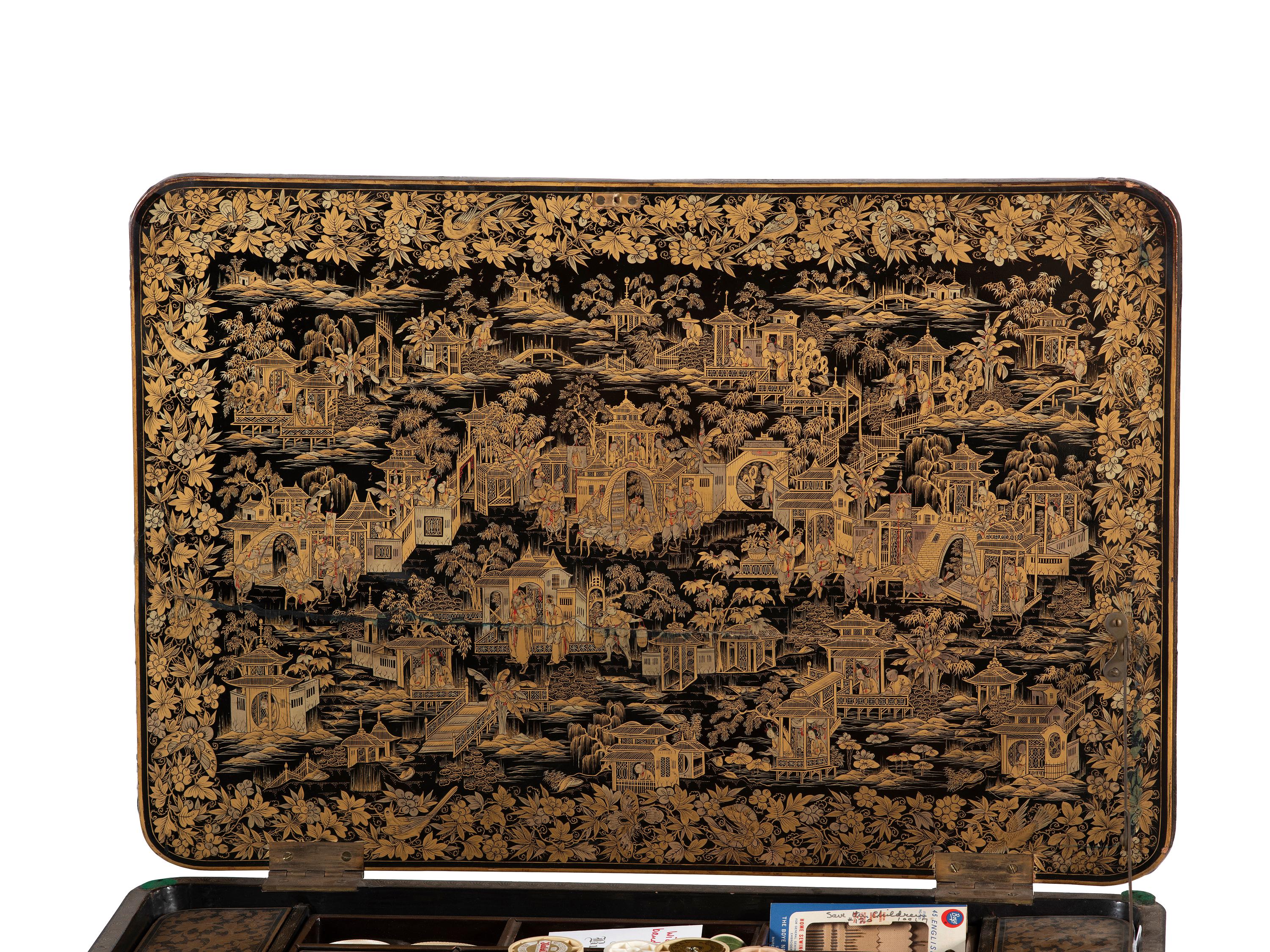 A Chinese Export Gilt and Black Lacquered Sewing Table