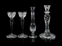 Waterford, a group of three crystal candlesticks, comprising a pair and a single, together with a bud vase