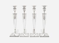 A set of four Neoclassical weighted sterling silver candlesticks, Gorham Mfg. Co, Providence, RI, bearing date mark for 1917