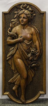 A Carved Oak Relief Panel. Height 33 inches.