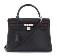 An Hermes Bicolor Noir and Bleu Indigo Swift and Taurillon Clemence 32cm Kelly Ghillies Handbag, 13" x 9.5" x 4.5".