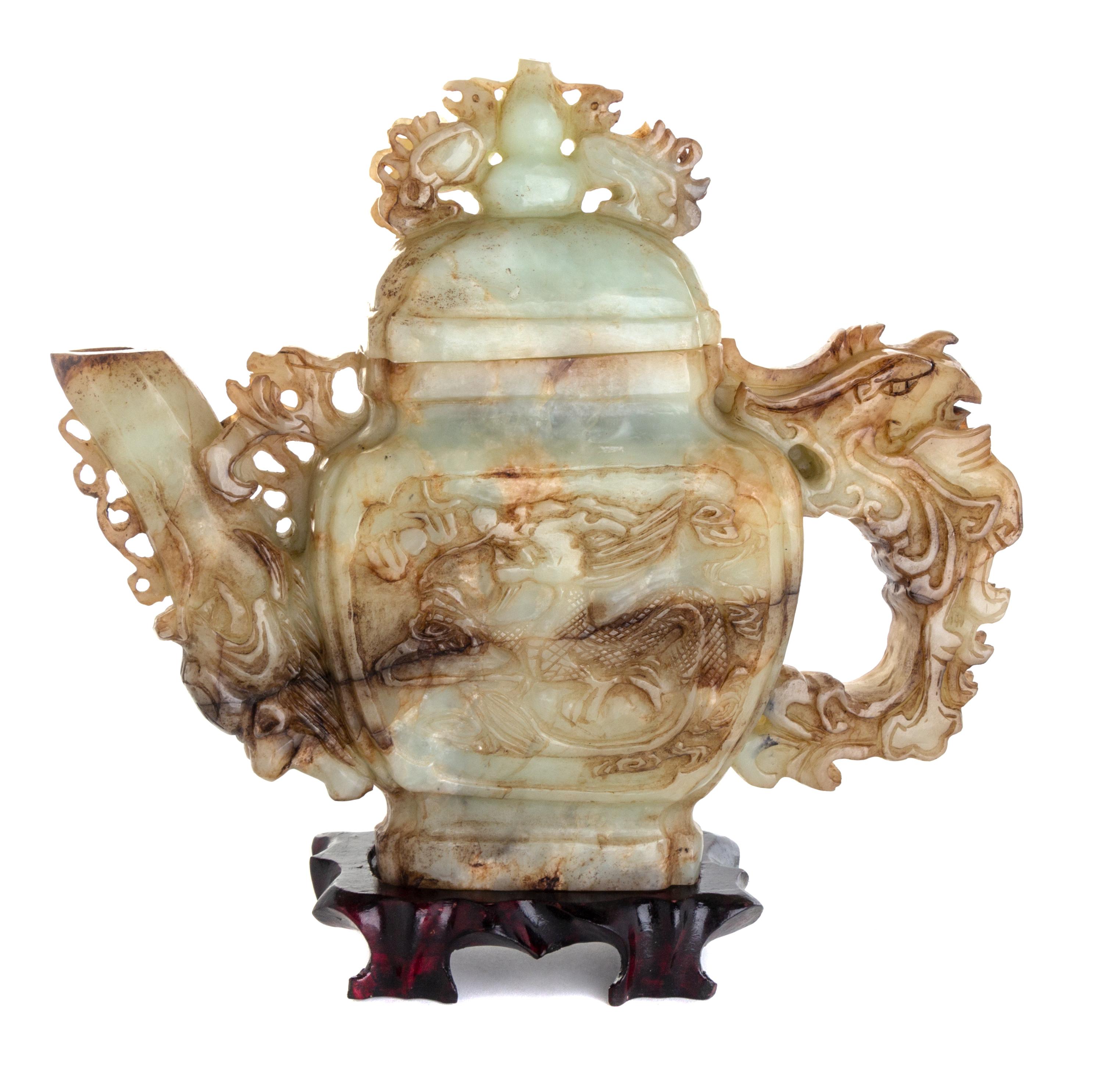 A Chinese Carved Hardstone Tea Pot Height 9 1/2 inches — 20TH CENTURY