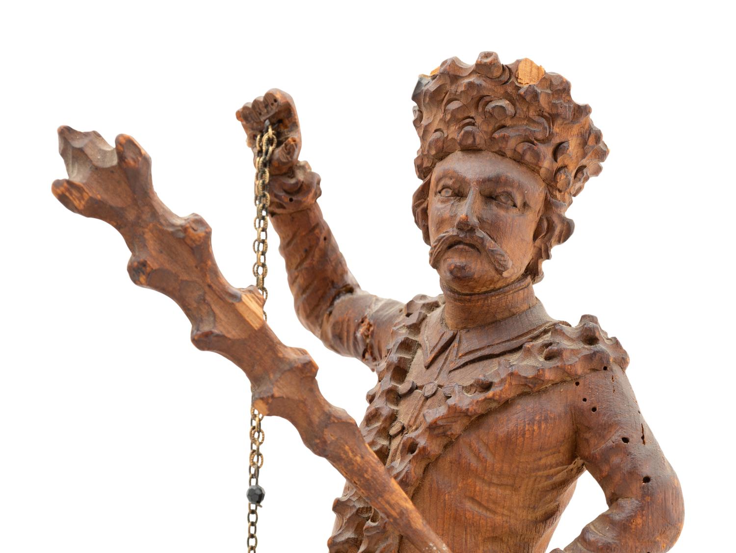 A Russian Carved Wood Figural Group