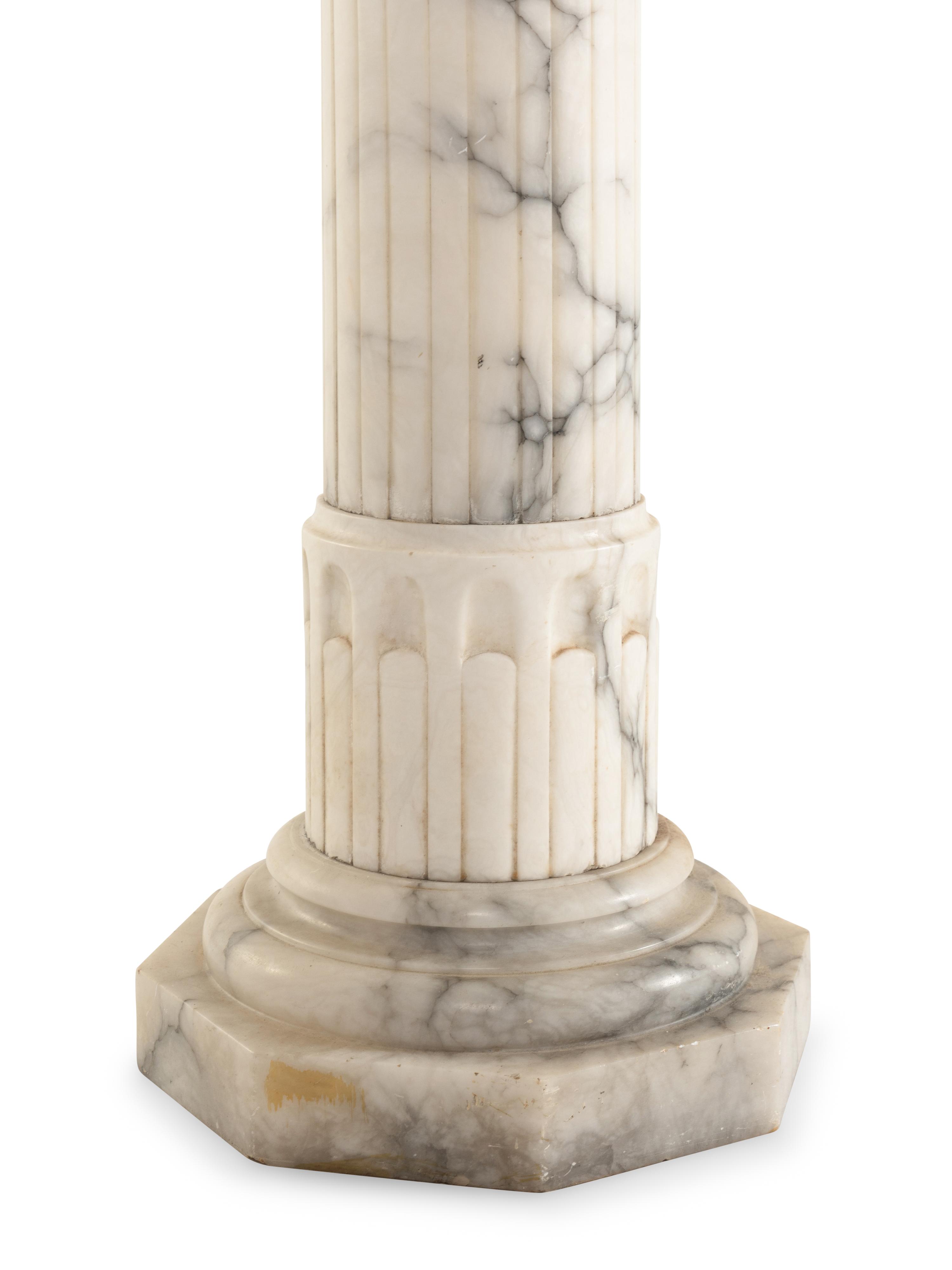 A Continental Carved Marble Pedestal
