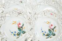 Nine English Porcelain Luncheon Plates and Five Continental Porcelain Cups with Saucers