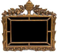 A Continental Giltwood Mirror — 19TH CENTURY
