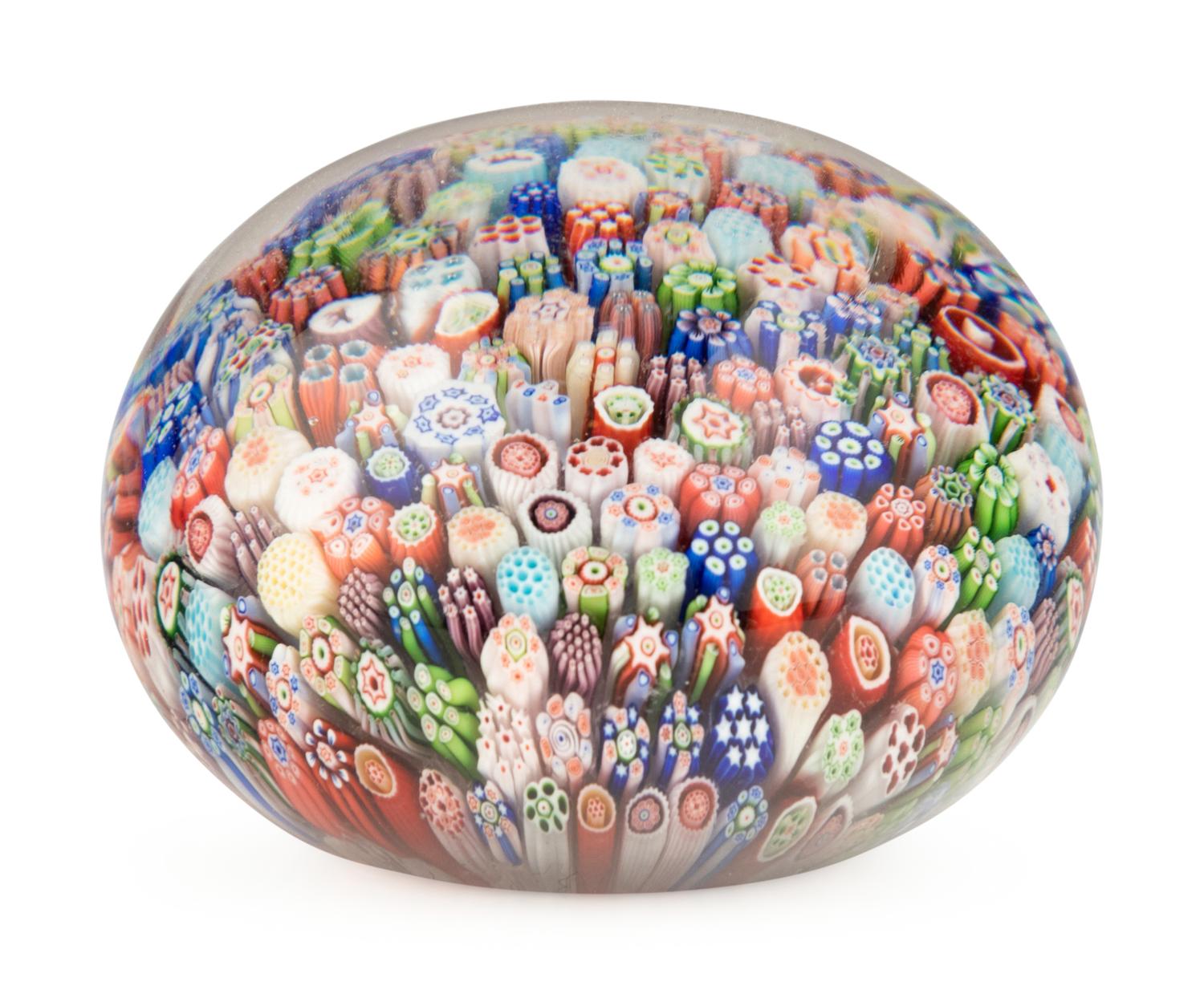 A Baccarat Close Packed Millefiori and Silhouette Glass Paperweight