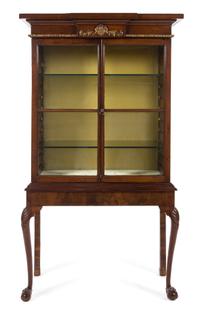 A Queen Anne Style Parcel Gilt Mahogany Vitrine Cabinet Height 70 x width 37 1/4 x depth 14 3/4 inches. — 19TH CENTURY