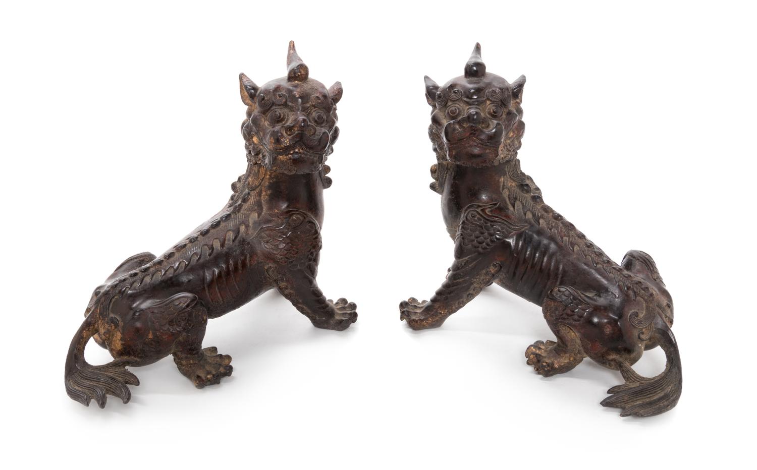 A Pair of Chinese Gilt Bronze Figures of Qilin Height 8 1/4 inches. — 20TH CENTURY