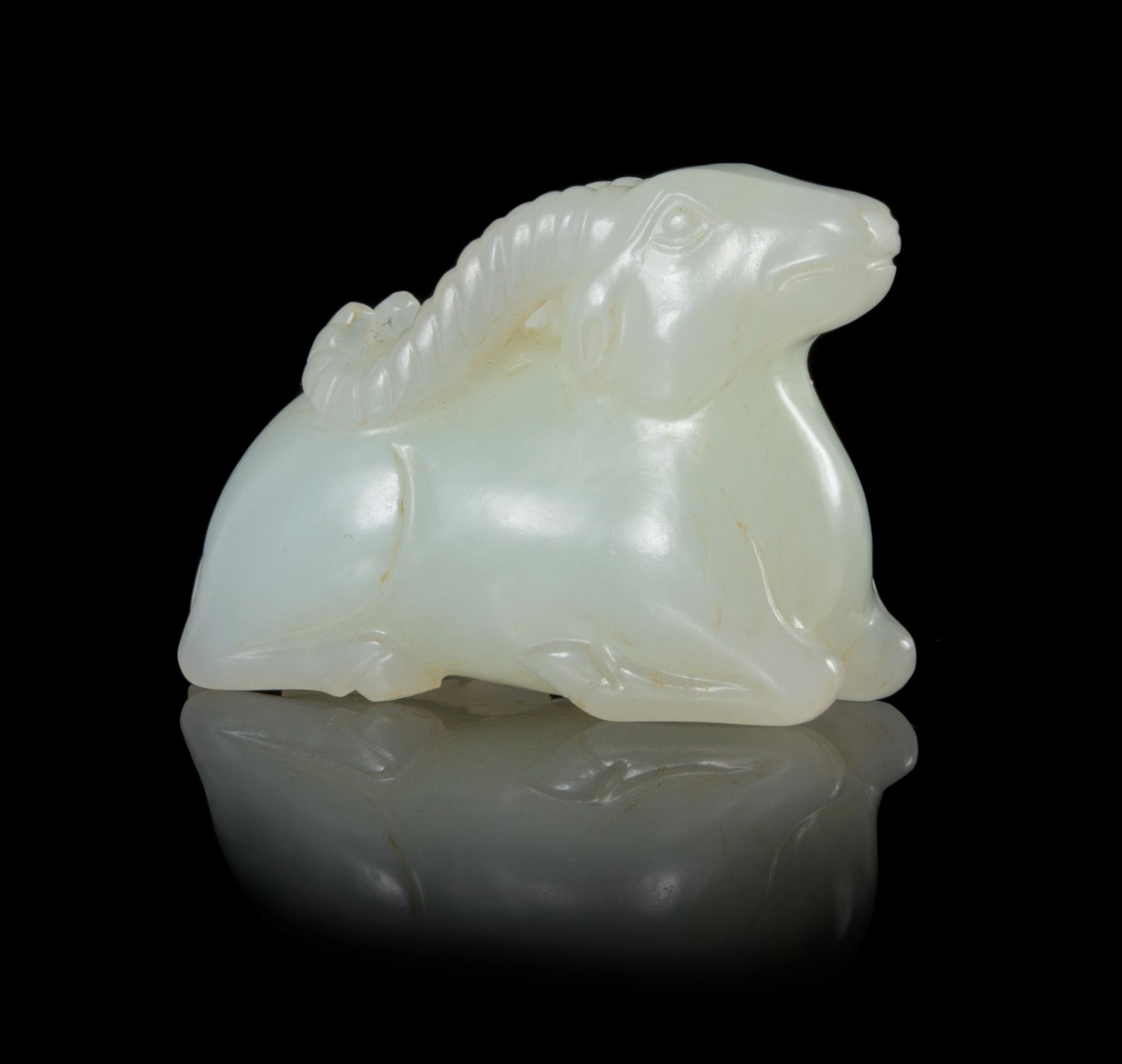 A White Jade Figure of a Ram Length 1 3/4 inches.