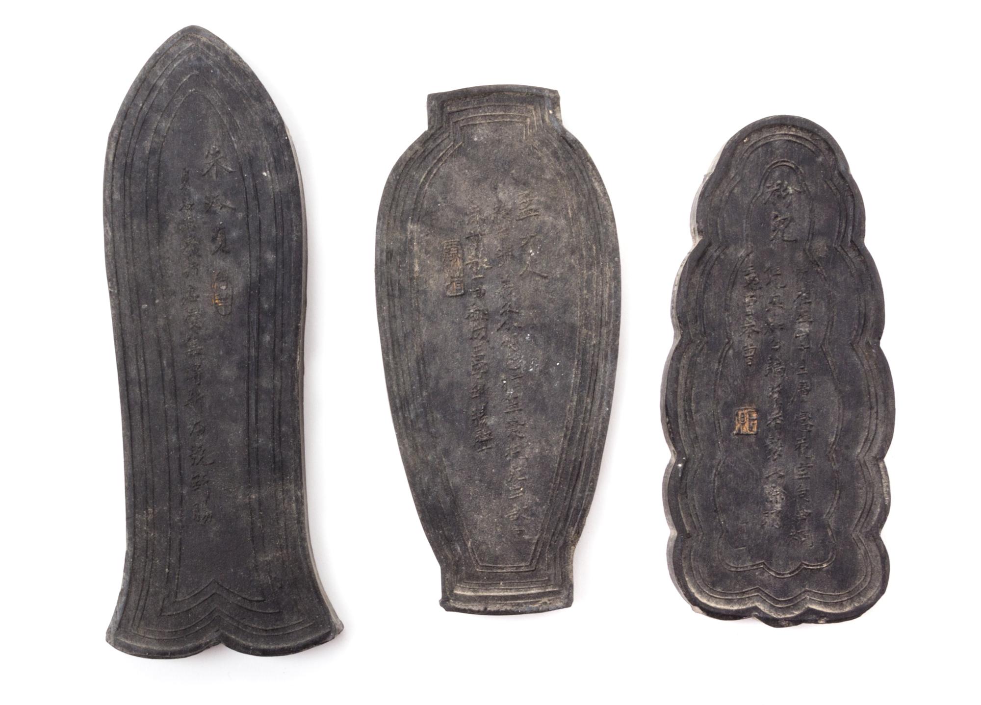 A Set of Eight Ink Cakes Length of longest 4 5/8 inches.