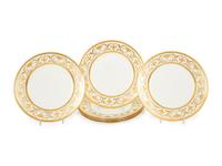 Two Sets of Gilt Decorated Porcelain Dinner Plates
