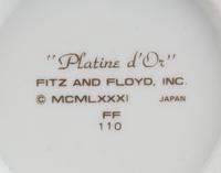 A Fitz and Floyd Porcelain Dinner Service
