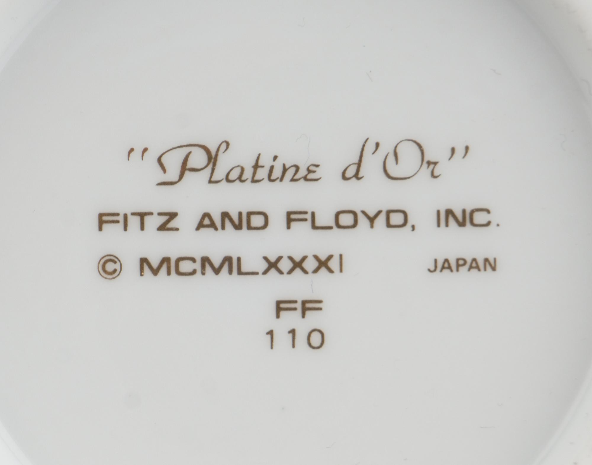 A Fitz and Floyd Porcelain Dinner Service