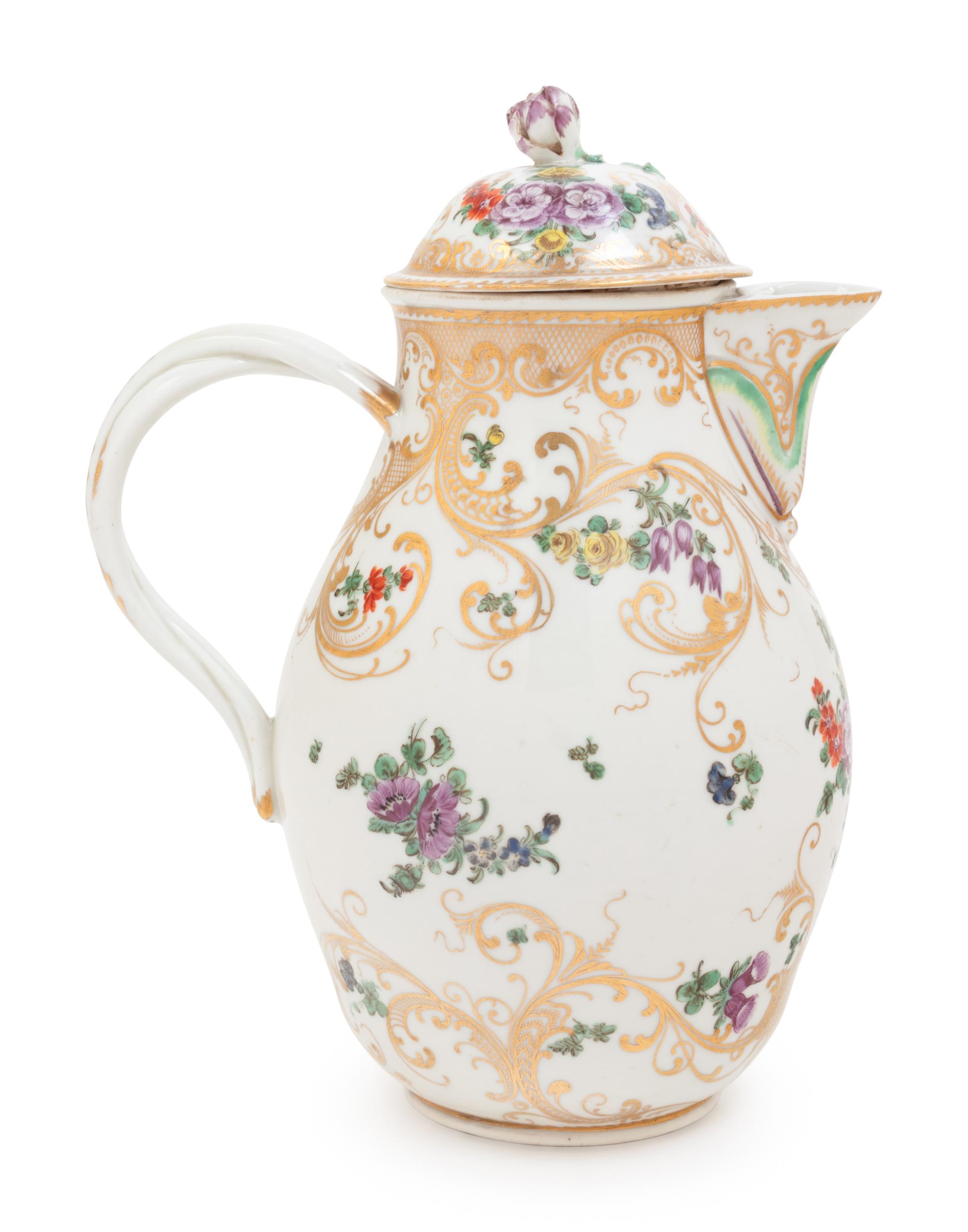 A Bristol Porcelain Covered Milk Jug