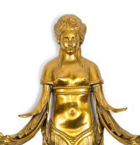 A Pair of French Style Gilt Bronze Figural Two-Light Sconces