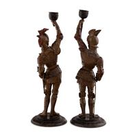 A Pair of Cold Painted Cast Metal Figural Candlesticks
