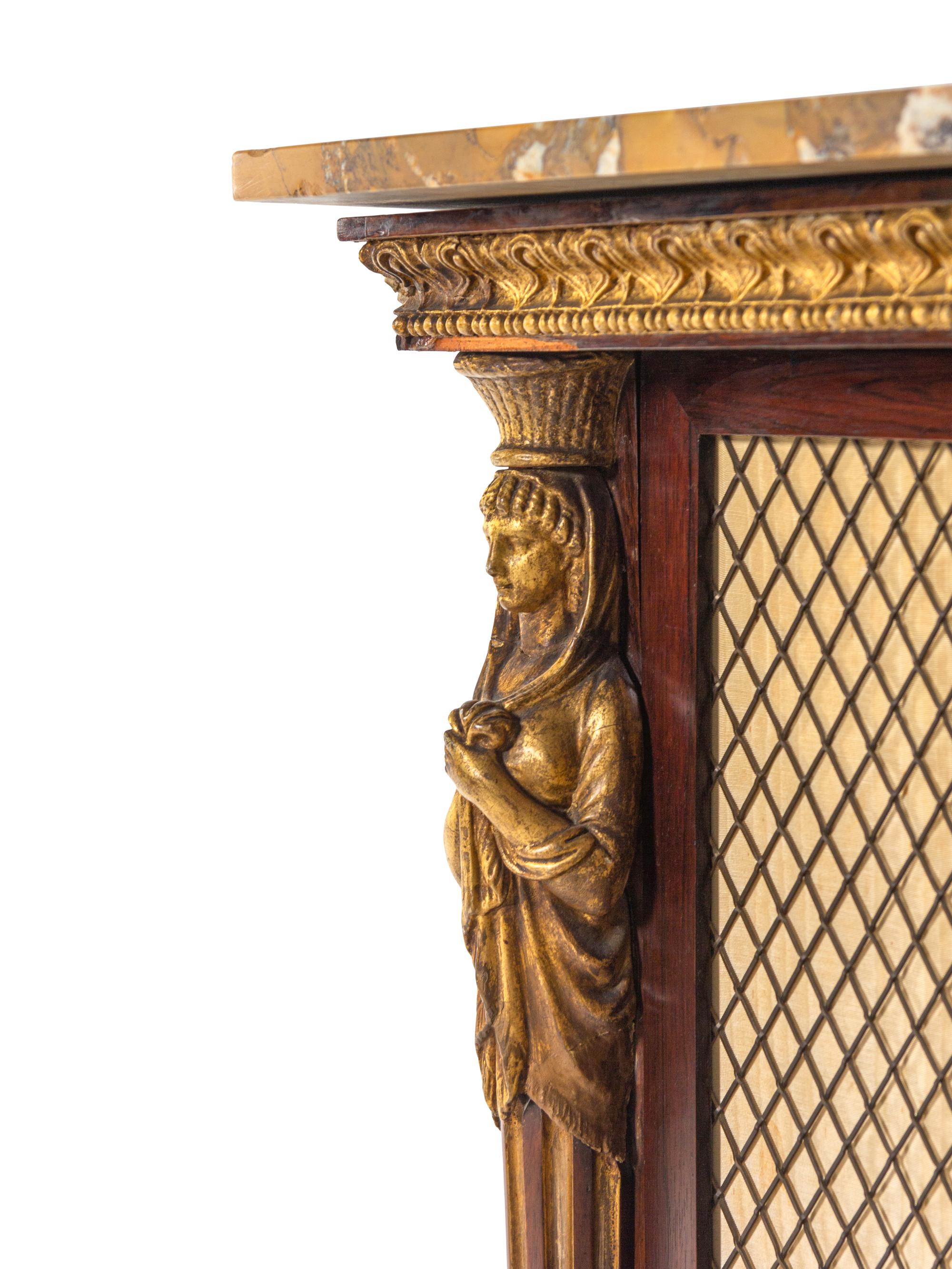 A Regency Egyptian Revival Style Parcel Gilt Rosewood Cabinet