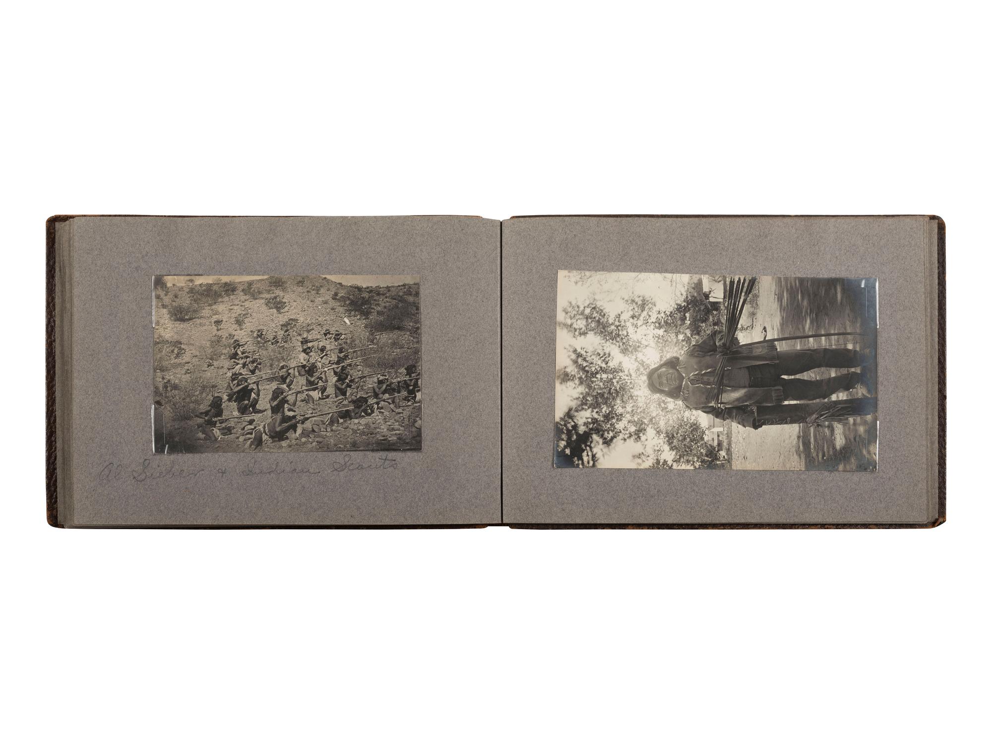 [NATIVE AMERICANS]. JONES, John Edward (1863-1922), photographer. Album containing 50 photographs of the San Carlos Indian Agency, including Apache civilians and police, agency buildings and dwellings, and scenic views. Ca 1904.