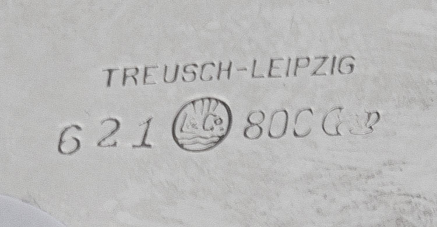 A German Silver Vase, Maker's Mark L&Co., 1920, retailed by Ernst Treusch, Leipzig, of baluster form, having a spot-hammered finish and