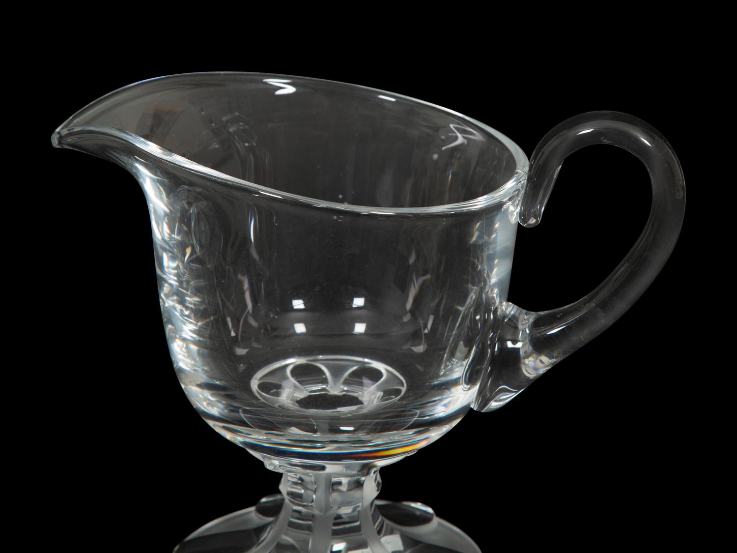 A Lalique Clear Glass Pitcher and an Orrefors Footed Bowl