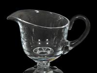 A Lalique Clear Glass Pitcher and an Orrefors Footed Bowl