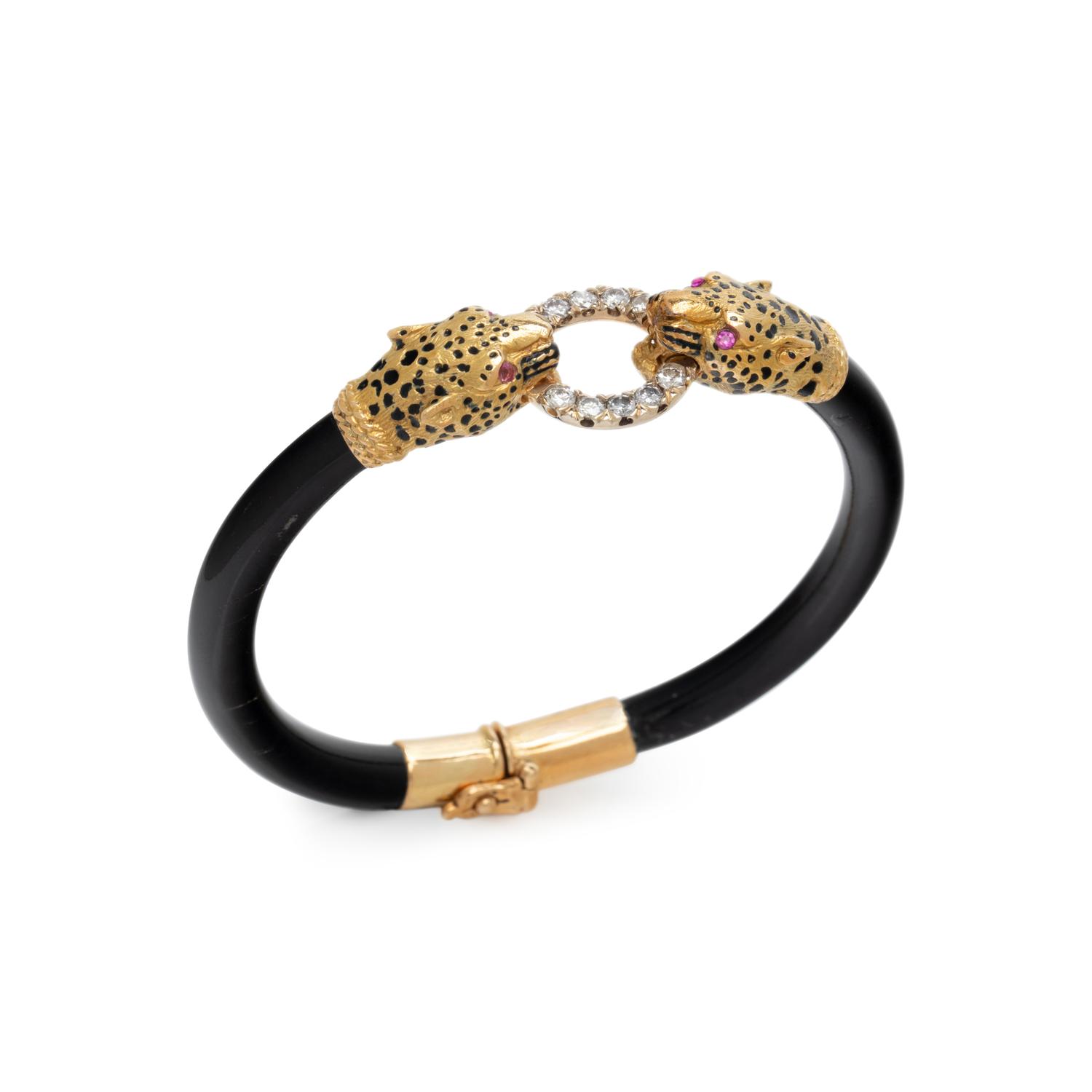 YELLOW GOLD, DIAMOND, AND ENAMEL PANTHER HEAD BANGLE BRACELET