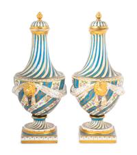 A Pair of Sèvres Style Porcelain Covered Vases