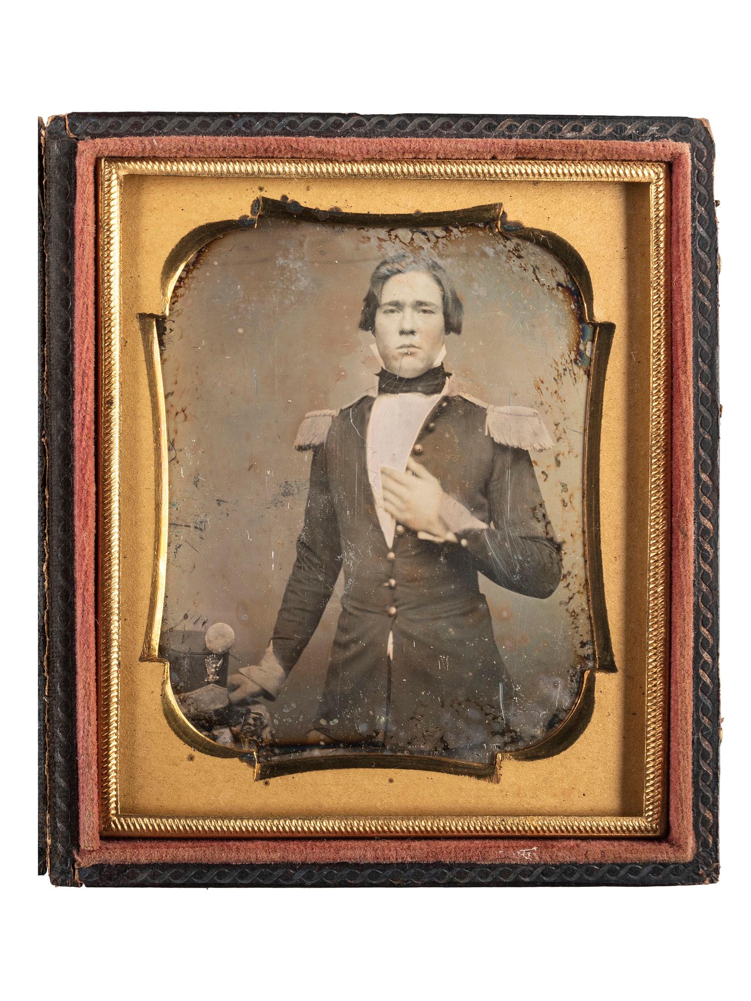 [MILITARIA]. A group of 2 daguerreotypes of militiamen, comprising: