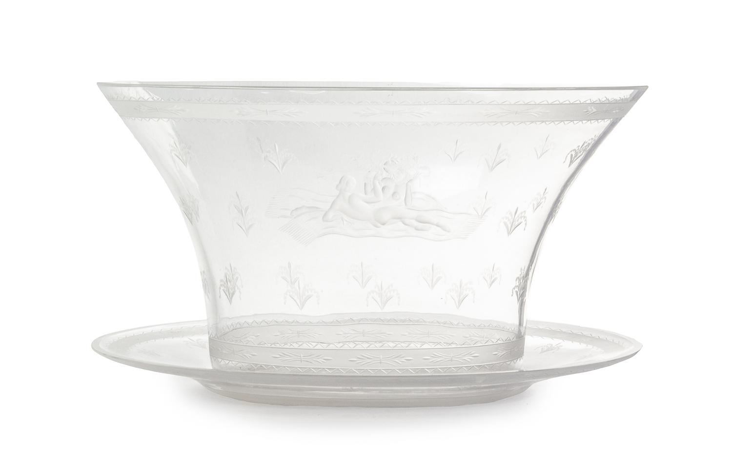 An Orrefors Bowl and Saucer Height of bowl 6 3/4 inches. — DESIGNED BY EDWARD HALD, 1926